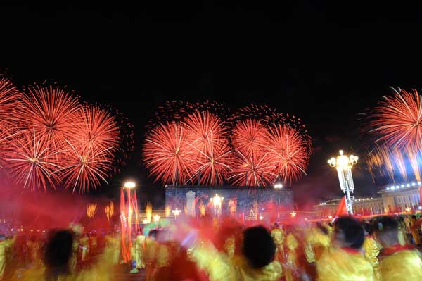 A grand evening gala is held to celebrate New China's 60th anniversary on Oct. 1 evening at the Tian'anmen Square in Beijing. Red, pink, white and orange fireworks shot up into the night sky, lighting up the Tian'anmen Rostrum. 