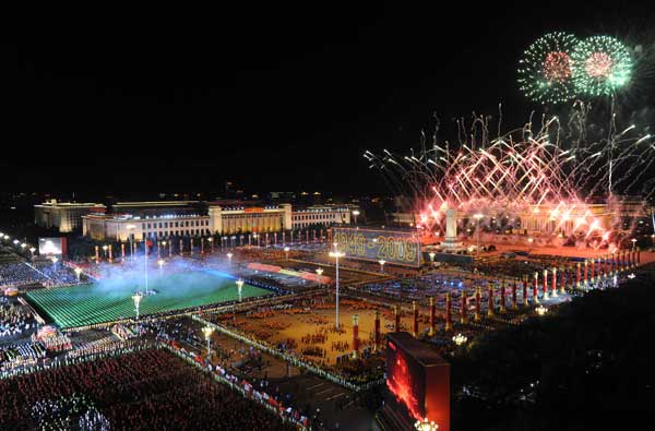 A grand evening gala is held to celebrate New China's 60th anniversary on Oct. 1 evening at the Tian'anmen Square in Beijing. Red, pink, white and orange fireworks shot up into the night sky, lighting up the Tian'anmen Rostrum. 