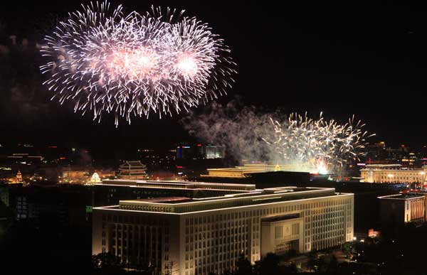 A grand evening gala is held to celebrate New China's 60th anniversary on Oct. 1 evening at the Tian'anmen Square in Beijing. Red, pink, white and orange fireworks shot up into the night sky, lighting up the Tian'anmen Rostrum. 