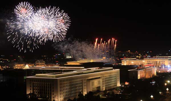 A grand evening gala is held to celebrate New China's 60th anniversary on Oct. 1 evening at the Tian'anmen Square in Beijing. Red, pink, white and orange fireworks shot up into the night sky, lighting up the Tian'anmen Rostrum.