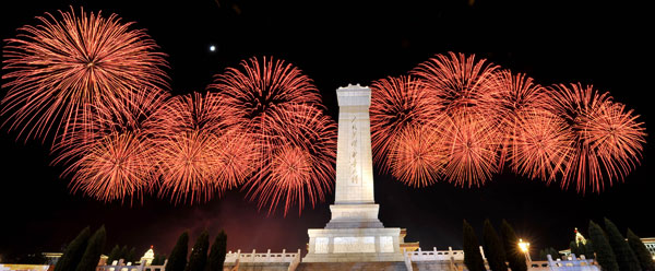 A grand evening gala is held to celebrate New China's 60th anniversary on Oct. 1 evening at the Tian'anmen Square in Beijing. Red, pink, white and orange fireworks shot up into the night sky, lighting up the Tian'anmen Rostrum.