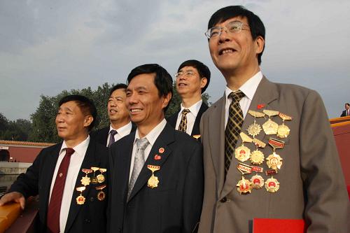 Model workers are also invited to watch the celebration at the Tian'anmen Square. [Xinhua]