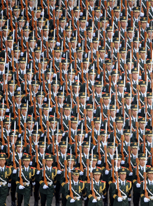 Guards of the national flag undertake the final practice for the celebrations for the 60th anniversary of the founding of the People's Republic of China, in central Beijing, capital of China, Oct. 1, 2009.(Xinhua/Dai Xuming)