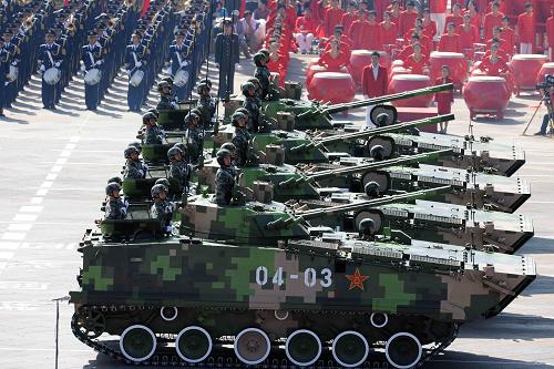 Track armored vehicles rolls into Tian'anmen Square for inspection.