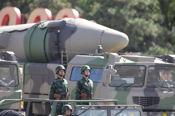 Conventional missiles are displayed in a parade of the celebrations for the 60th anniversary of the founding of the People's Republic of China, on Chang'an Street in central Beijing, capital of China, Oct. 1, 2009. (Xinhua/Xing Guangli) 