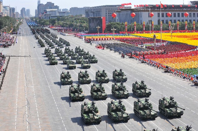 Self-propelled howitzers march into the Tian'anmen Square at the National Day Military Parade