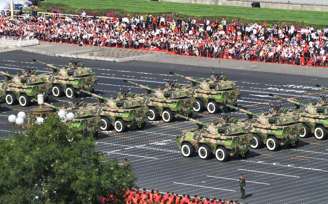 Self-propelled wheeled assault guns march into the Tian'anmen Square at the National Day Military Parade.