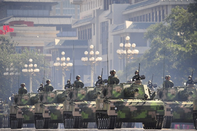 Self-propelled howitzers march into the Tian'anmen Square at the National Day Military Parade.