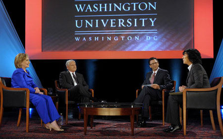 U.S. Secretary of State Hillary Clinton (L) and Secretary of Defense Robert Gates attend a discussion on American Power and Persuasion at the the George Washington University in Washington October 5, 2009.