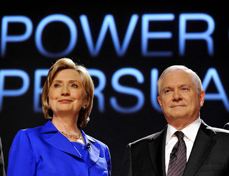 U.S. Secretary of State Hillary Clinton (L) and Secretary of Defense Robert Gates attend a discussion on American Power and Persuasion at the the George Washington University in Washington October 5, 2009.