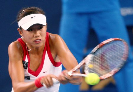 Zhang Shuai of China returns a shot to World number one Dinara Safina of Russia during the second round match of women's singles at China Open 2009 in Beijing, capital of China, Oct. 5, 2009. Zhang Shuai won 2-0.