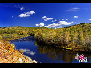 Daxinganling, also known as the Greater Khingan Range, is a volcanic mountain range in northeastern China. This region is covered by forests of larch, birch, aspen and pine, with shrub cover on the highest elevations. It is rich in wildlife, including deer, elk, marten, hare and many other fur-bearing animals. These photos were taken in September of 2009 by Yu Wenbin.