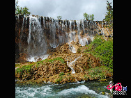 Jiuzhaigou Valley is a nature reserve in northern Sichuan province of China.It is known for its many multi-level waterfalls and colorful lakes, and was declared a UNESCO World Heritage Site in 1992.Jiuzhaigou lies at the southern end of the Minshan mountain range, 330 km north of the provincial capital of Chengdu. It is part of the Jiuzhaigou County (formerly Nanping County) in the Aba Tibetan Qiang Autonomous Prefecture of northwestern Sichuan province, near the Gansu border. [Photo by Liu Guoxing] 