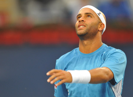 James Blake of the U.S. reacts during the men&apos;s singles second round match against Rafael Nadal of Spain at the China Open tennis tournament in Beijing, Oct. 8, 2009. Blake lost 1-2.(Xinhua/Luo Xiaoguang)