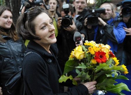 Romanian-born German writer Herta Mueller leaves her apartment after she had won the 2009 Nobel literature prize in Berlin, October 8, 2009. Mueller, who charted the brutality and oppressiveness of Nicolae Ceausescu