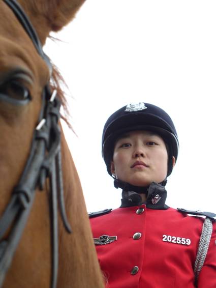 Mounted Policewoman in the coastal city of Dalian (Photo by Tom Carter)