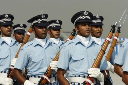 Soldiers parade during the Indian Air Force Day celebration on the outskirts of New Delhi, capital of India, Oct. 8, 2009. The Indian Air Force celebrated its 77th Anniversary on Thursday. [Partha Sarkar/Xinhua] 