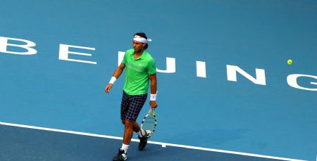 Rafael Nadal of Spain reacts during the men's singles semifinal match against Marin Cilic of Croatia at the China Open tennis tournament in Beijing, Oct. 10, 2009.(Xinhua/Gong Lei)