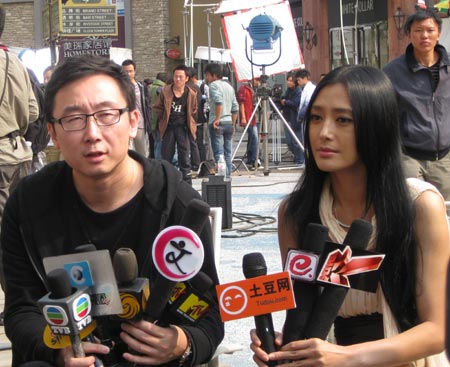 Lu Chuan(L) and Qin Lan(R) receive interview. [Fan Junmei/China.org.cn]