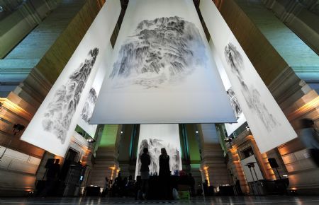 Huge Shanshui paintings, Chinese traditional painting style depicting scenery or natural landscapes, created by Chinese painter Xu Longsen are hanged at the atrium of the Justice Palace during the exhibition 'On Top of A Thousand Mountains' in Brussels, capital of Belgium October 11, 2009.[Wu Wei/Xinhua]