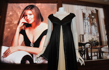 Various wardrobe items owned by Barbra Streisand are shown at a press preview of items from the auction 'The Collection of Barbra Streisand' in Beverly Hills October 12, 2009. Julien's Auctions will offer items collected by singer Barbra Streisand at the auction on October 17 and 18, with proceeds going to The Streisand Foundation. [Xinhua/AFP] 