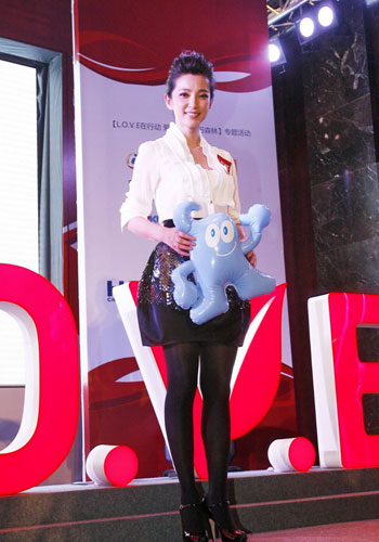 Chinese actress Li Bingbing poses at an event on October 12, 2009 in Beijing, where she was named 'charity love ambassador' for the World Expo 2010 Shanghai.