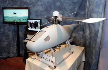 Black Eagle unmanned helicopter robotic observation system for military and civilian missions is displayed at the Israel Defense Exhibition in Tel Aviv Wednesday October 14, 2009. [Xinhua]