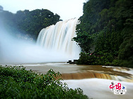 Huangguoshu Waterfall, also known as Yellow Fruit Tree Waterfall is the one of the largest waterfall in China and Asia located on the Baihe Riverin Anshun, Guizhou Province. It is 77.8 m (255 feet) high and 101 m (330 feet) wide. The main waterfall is 67 m (220 feet) high and 83.3 m (273 feet) wide. [Photo by Wang Maohuan]