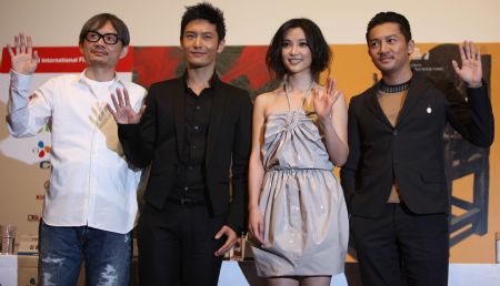 (from L to R) Director Chen Kou-fu, actor Huang Xiaoming, actress Li Bingbing and actor Su Yu Peng attend the premiere of film 'The Message' during the Pusan International Film Festival (PIFF), in Pusan, South Korea, Oct. 15, 2009. 'The Message' was chosen as the closer of the PIFF. Based on a famous novel under the same title, the film distinguishes itself from other war thrillers with its well- plotted storyline, as well as main characters' detailed acting.