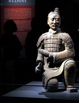 A terra cotta warrior is on display at the Houston Museum of Natural Science in Houston, the United States, on Oct. 18, 2009. The exhibition 'Terra Cotta Warriors: Guardians of China's First Emperor' is concluded at the museum on Sunday, receiving over 200,000 visitors during its 5-month-long exhibition period. [Chen Ruwei/Xinhua]