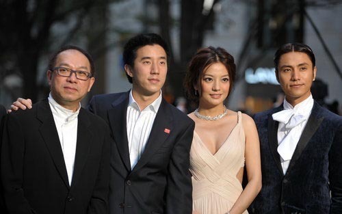 From L to R, 'Mulan' director Jingle Ma and cast members Joyce Chan, Zhao Wei and Chen Kun cast arrive for the red carpet of the Tokyo International Film Festival on Saturday, October 17, 2009 in Tokyo, Japan. [sina.com]