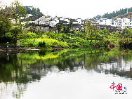 Wuyuan, known as the 'most beautiful countryside in China,' is home to at least 50 old villages.Wuyuan lies in the center of the 'tourist golden triangle' formed by the Yellow Mountain (Anhui Province), Mt. Lushan, and Jingdezhen, China's 'Porcelain Capital.' (Jiangxi Province). [Photo by Chen Yan]