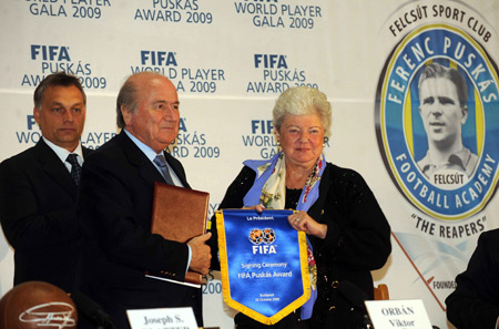 FIFA President Joseph Blatter, left, and Erzsebet Puskas, wife of Hungary's legendary soccer player Ferenc Puskas, are seen together at the Ferenc Puskas Football Academy in Felcsut, Hungary, Tuesday, Oct. 20, 2009. (Xinhua/Hungarian News Agency) 