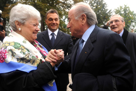 FIFA President Joseph Blatter, right, and Erzsebet Puskas, wife of Hungary's legendary soccer player Ferenc Puskas, are seen together at the Ferenc Puskas Football Academy in Felcsut, Hungary, Tuesday, Oct. 20, 2009. (Xinhua/Hungarian News Agency) 