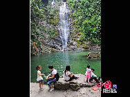 Dinghu Mountain is located in Dinghu District, 18km to the east of Zhaoqing City, in the Dayunwu Mountain Range, in Guangdong Province of southern China. It is one of the four famous mountains - Danxia, Dinghu, Xiqiao and Luofu in Guangdong Province. With a nickname as 'a living museum of nature', Dinghu Mountain is a popular tour site.[Photo by Liu Guoxing]