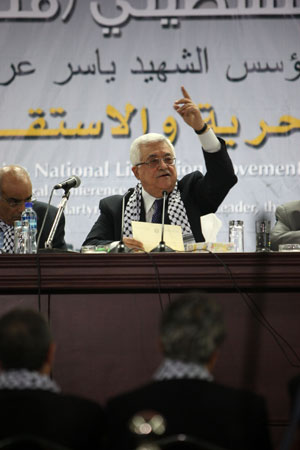 File photo taken on Aug. 4, 2009 shows Palestinian President Mahmoud Abbas speaking during the opening of the Fatah congress in the West Bank town of Bethlehem. Abbas on Friday called on the Palestinians in the Palestinian territories to hold the general legislative and presidential elections on Jan. 24, 2010. [Xinhua] 