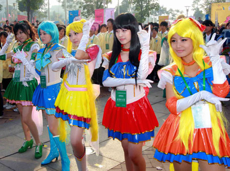 Actresses perform in a cosplay show during the opening ceremony of a cartoon creative industry fair held in Wuhu, east China's Anhui Province, Oct. 23, 2009. The 2nd China International Cartoon Creative Industry Fair kicked off at Wuhu International Exhibition Center on Friday, attracting 238 enterprises and organizations from home and abroad. [Xinhua]