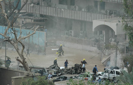 The photo taken on Oct. 25, 2009 shows the site of a suicide attack near the building of Baghdad provincial council in Baghdad, capital of Iraq. (Xinhua/Gao Shan)