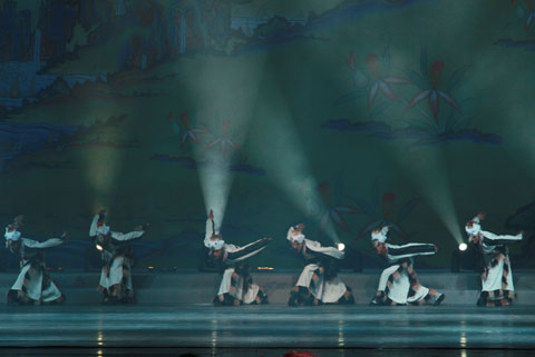 Dancers of Xigaze Ethnic Art Troupe perform the Tibetan song and dance drama 'Rainbow of Qomolangma' at Shanghai's Majestic Theater on October 23, 2009. 