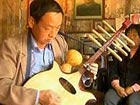 Chinese farmer fiddles around