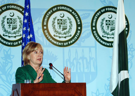 US Secretary of State Hillary Clinton gestures as she addresses media representatives during a press conference at the Foreign Minister's office in Islamabad, Oct. 28, 2009. Hillary Clinton kicked off a visit to Pakistan, fending off criticism of US policies from within a key ally in the war on Islamists and promising new investments.(Xinhua/Li Jingchen)