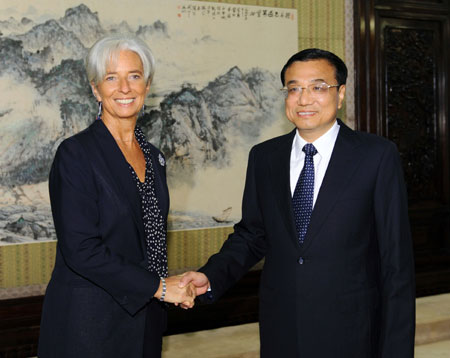 Chinese Vice Premier Li Keqiang (R) meets with France Financial Minister Christine Lagarde in Beijing, Oct. 28, 2009. (Xinhua/Li Tao)