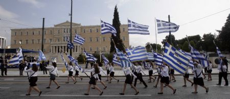 Students parade in central Athens, capital of Greece, Oct. 28, 2009.(Xinhua/Marios Lolos)