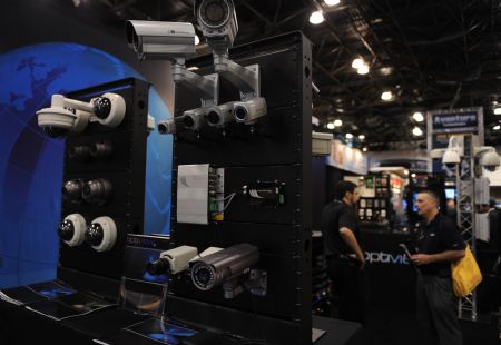 Different kinds of camera lens are shown at International Security Conference East 2009 in New York of the United States, Oct. 28, 2009.(Xinhua/Shen Hong)