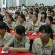 Factory workers at Chicony Electronics in Dongguan take part in a labor rights training program organized in partnership between Chicony, Hewlett Packard and Hong Kong NGO SACOM. 