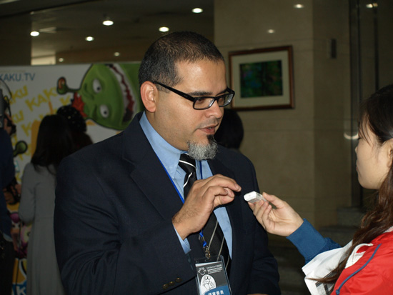 David Pimentel, a head of story at DreamWorks Animation receives an interview with a reporter during the opening ceremony of Aniwow! 2009 at the Communication University of China (CUC) on Wednesday, October 28, 2009.