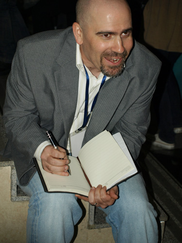 Ben Balistreri, a DreamWorks character designer receives an interview with a reporter during the opening ceremony of Aniwow! 2009 at the Communication University of China (CUC) on Wednesday, October 28, 2009. 