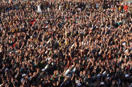 Kashmiri Muslim protesters shout slogans during a protest rally in Baramulla, about 55 kilometers (34 miles) north of Srinagar, summer capital of Indian controlled Kashmir, Oct. 30, 2009. (Xinhua/Javed Dar)