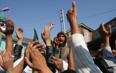 Kashmiri Muslim protesters shout slogans during a protest rally in Baramulla, about 55 kilometers (34 miles) north of Srinagar, summer capital of Indian controlled Kashmir, Oct. 30, 2009. (Xinhua/Javed Dar)