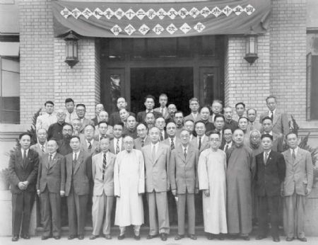 File photo shows Bei Shizhang (2nd R, last row), founder of China's biophysics and exobiology sciences, stands with other scientists in Beijing in 1948. Bei Shizhang passed away in Beijing on Oct. 29, 2009. (Xinhua)